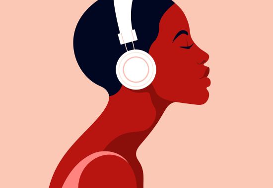 The girl listens to music on headphones. Music therapy. Profile